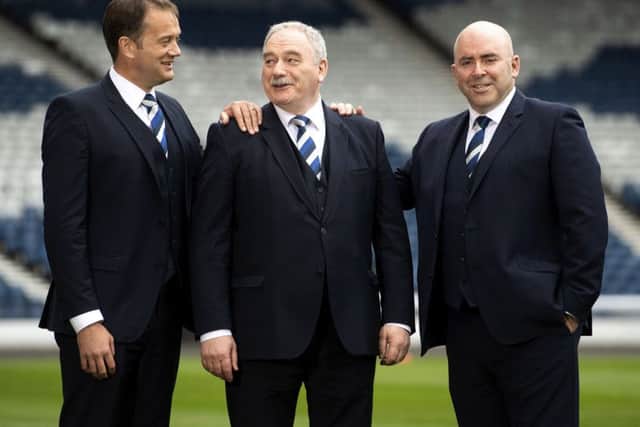 SFA chief executive Ian Maxwell, left, alongside new president Rod Petrie, centre, and new vice-president Mike Mulraney. Picture: Gary Hutchison/SNS