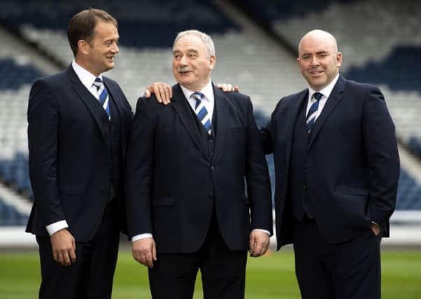 SFA chief executive Ian Maxwell, left, alongside new president Rod Petrie, centre, and new vice-president Mike Mulraney. Picture: Gary Hutchison/SNS