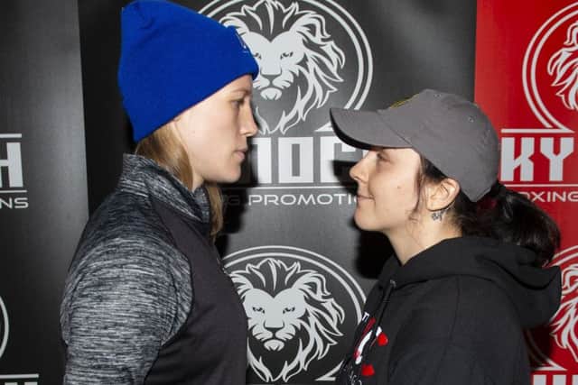 Sarah Curran is dwarfed by Hannah Rankin at the weigh-in but is unfazed by the disadvantage. Picture: SNS.