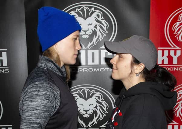 Sarah Curran is dwarfed by Hannah Rankin at the weigh-in but is unfazed by the disadvantage. Picture: SNS.