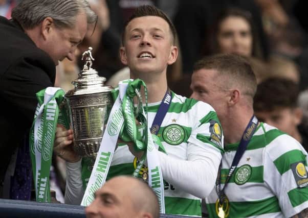 Callum McGregor lifts the Scottish Cup last month, just one highlight in a remarkable season that stretched to 69 games. Picture: Craig Foy/SNS