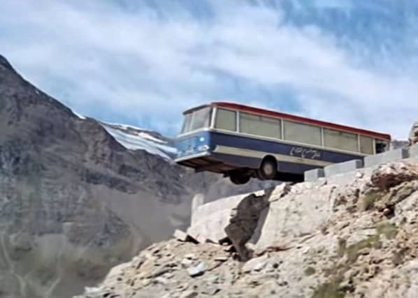 The coach was used in the scene where it was dangled over the cliff edge, while interiors were filmed in London. The Bus was later bought by racing driver Archie Cromar and converted into a transporter for his Formula Ford racing car.