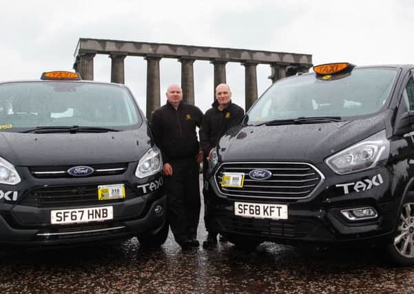 Cab drivers Danny Tebb and Richard Dourley are losing out because of the new regulations. Picture: Scott Louden