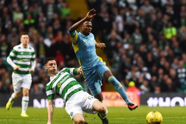 Twumasi in action against Celtic's Kieran Tierney