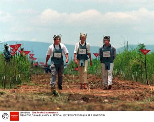Mandatory Credit: Photo by Tim Rooke/Shutterstock (268684ae)
PRINCESS DIANA AT A MINEFIELD
PRINCESS DIANA IN ANGOLA, AFRICA - 1997