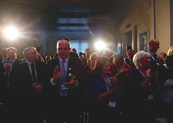 Supporters including Iain Duncan Smith, centre left, and Priti Patel, centre right, applaud after Boris Johnson's official launch of his leadership campaign. Picture: 
Frank Augstein/AP