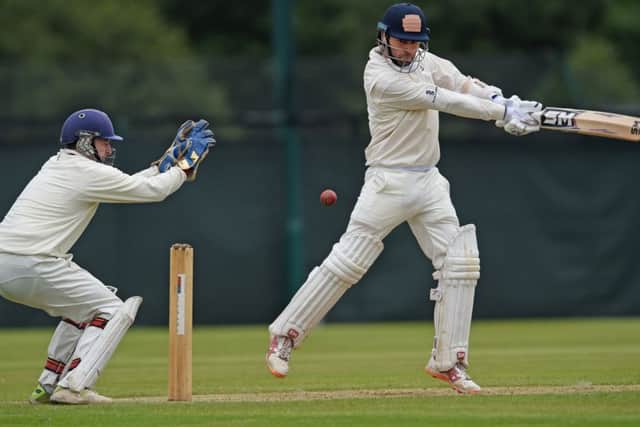 James Dickinson square cuts during Granges innings against Watsonians. Picture: Neil Hanna.