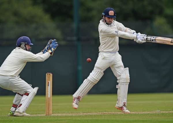 James Dickinson square cuts during Granges innings against Watsonians. Picture: Neil Hanna.