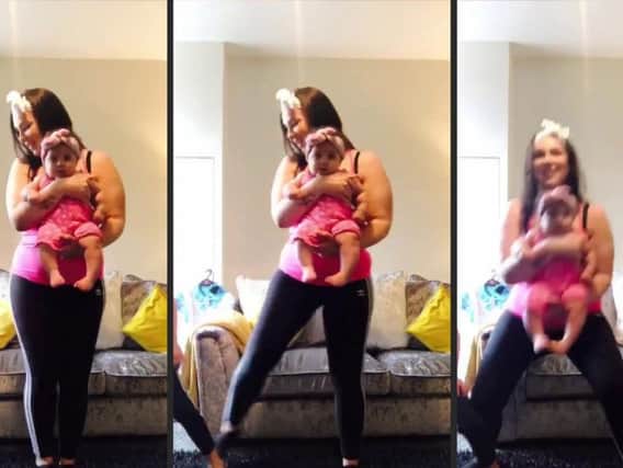 Charlotte Brooks doing her workout with daughters Sadie, eight, and four-month-old Mylah.