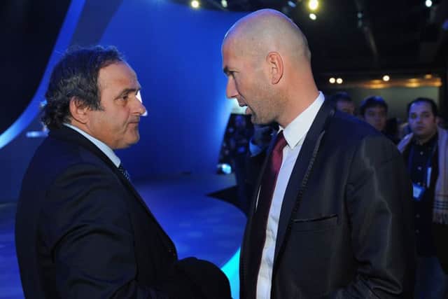 Michel Platini with fellow France legend Zinedine Zidane (Photo by Michael Regan/Getty Images)