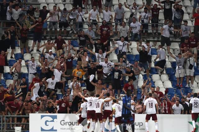Sarajevo players celebrate a goal in front of their fans in a 2-2 Europa League draw with Atalanta in Italy last year