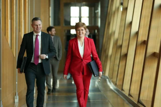 Derek Mackay, left, warned that recent growth in the Scottish economy could be undone by Brexit