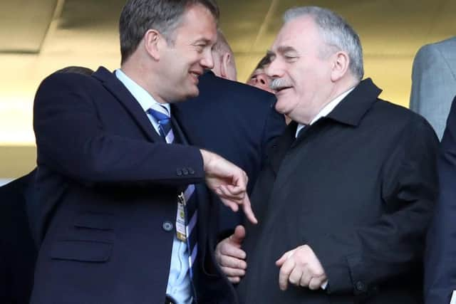 Rod Petrie, right, recently became chairman of the SFA.