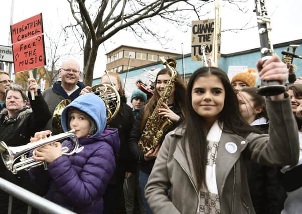 Protesters defeated plans to cut music tuition in Midlothian in February, but they have now been resurrected (Picture: Lisa Ferguson)
