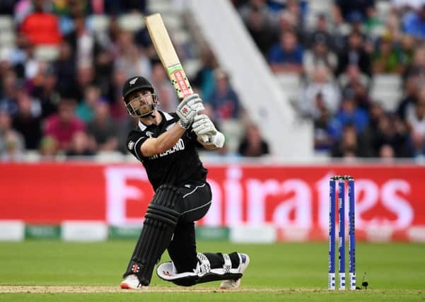 Kane Williamson hits the six which took him to a hundred and New Zealand to the brink of victory. Picture: Alex Davidson/Getty