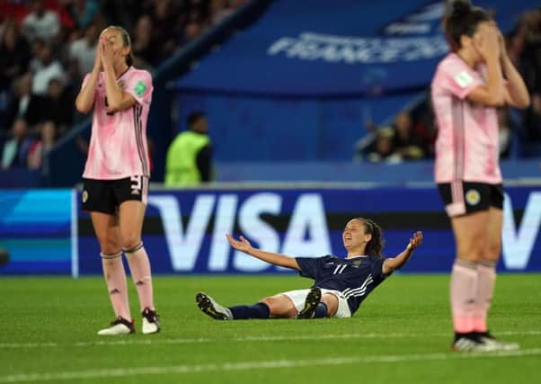 Argentina's forward Florencia Bonsegundo celebrates and it's agony for the Scots. Picture: Lionel Bonaventure/ AFP/Getty Images