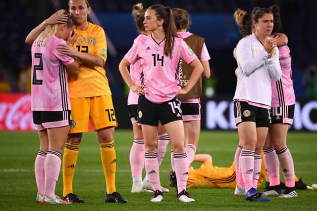 Scottland players console each other at full time in the Parc des Princes. Picture: Franck Fife/AFP/Getty Images