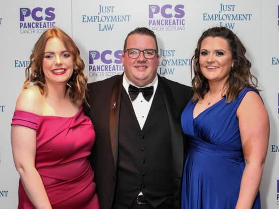 From left: Just Employment Law's Gillian Cumming, David McRae and Louise Walker raise money and awareness at the Summer Ball in Glasgow. Picture: Contributed