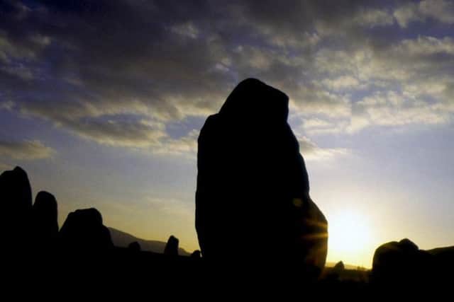 Stone circle at sunset in Orkney Islands. (Image: Shutterstock)