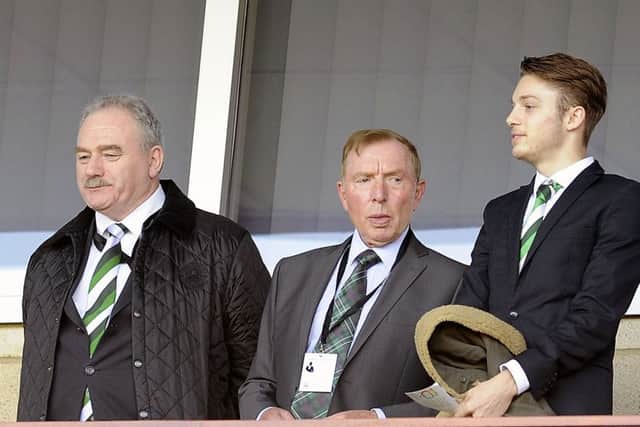 Sir Tom Farmer, centre, with Rod Petrie, at Hampden in 2015. Picture: Michael Gillen