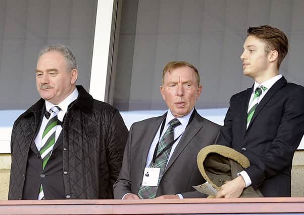 Sir Tom Farmer, centre, with Rod Petrie, at Hampden in 2015. Picture: Michael Gillen