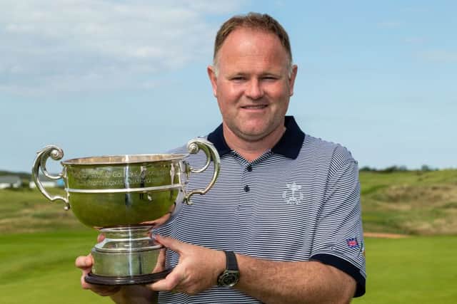 Alastair Forsyth shows off the Titleist & Footjoy PGA Professional Championship trophy after his runaway victory at Hunstanton in Norfolk. Picture: Getty Images