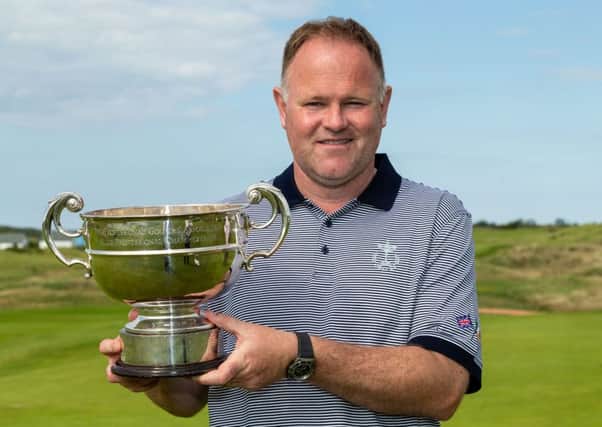 Alastair Forsyth shows off the Titleist & Footjoy PGA Professional Championship trophy after his runaway victory at Hunstanton in Norfolk. Picture: Getty Images