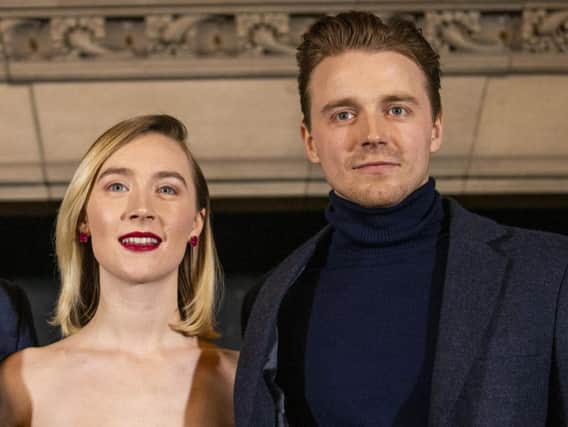 Jack Lowden with Saoirse Ronan at the Scottish Premiere of Mary Queen of Scots.