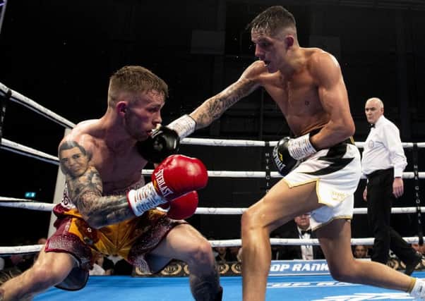 Lee McGregor lands a right-hander on the way to his victory over Scott Allan on Saturday. Picture: SNS.