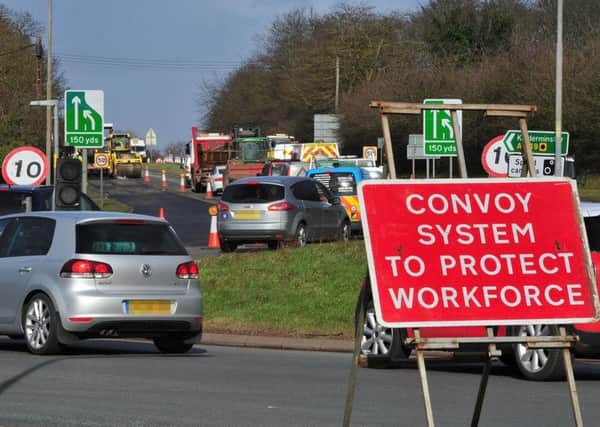 Road workers have warned of numerous 'near misses' due to drivers entering roadwork areas.