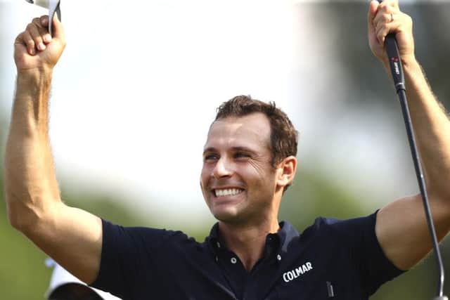 Italy's Andrea Pavan celebrates after winning the Golf BMW International Open in Munich. Picture: Matthias Schrader/AP