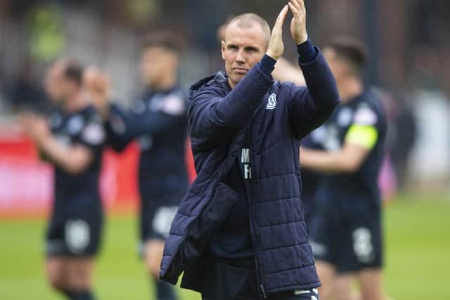 Kenny Miller scored eight goals in 35 Dundee appearances last season but recently missed out on landing the managers job at the club. Picture: SNS.