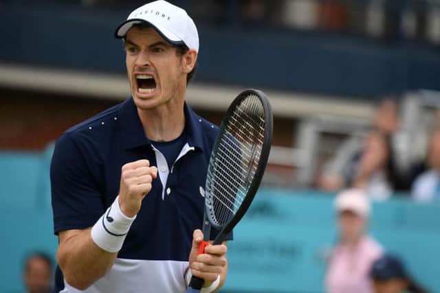 Andy Murray celebrates a point in the doubles final at Queen's. Picture: Getty Images