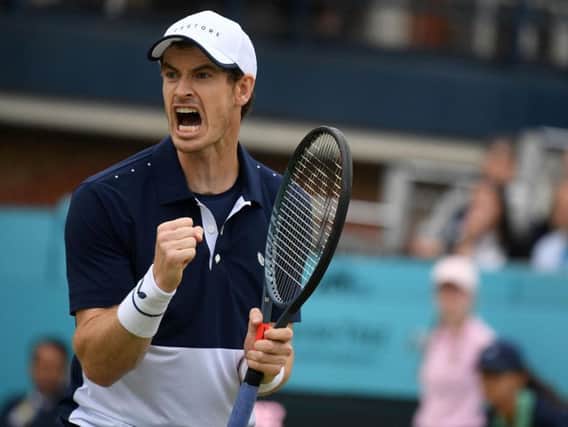 Andy Murray celebrates a point in the doubles final at Queen's. Picture: Getty Images