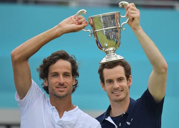 Andy Murray, right, and Feliciano Lopez celebrate their doubles win at Queen's Club. Picture: AFP/Getty Images