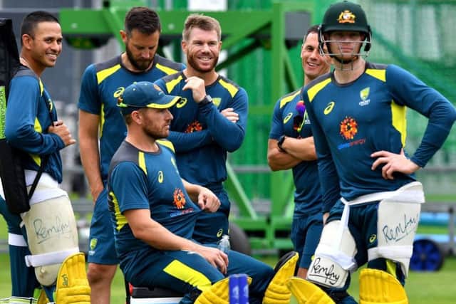 Australia's Usman Khawaja (L), Australia's captain Aaron Finch (3L), Australia's David Warner (C) and Australia's Steve Smith (2R) during practice ahead of the World Cup match against England. Picture: Saeed Khan/AFP/Getty Images
