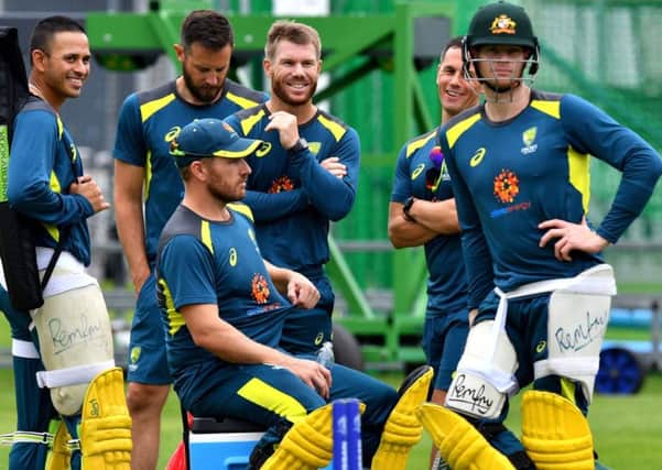 Australia's Usman Khawaja (L), Australia's captain Aaron Finch (3L), Australia's David Warner (C) and Australia's Steve Smith (2R) during practice ahead of the World Cup match against England. Picture: Saeed Khan/AFP/Getty Images