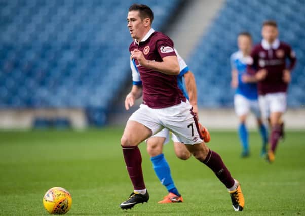 Jamie Walker, currently at Wigan but out of favour, looks set to play in a Hearts shirt again. Picture: SNS.
