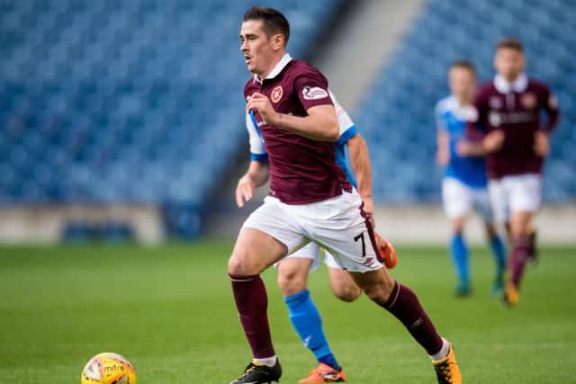 Jamie Walker, currently at Wigan but out of favour, looks set to play in a Hearts shirt again. Picture: SNS.