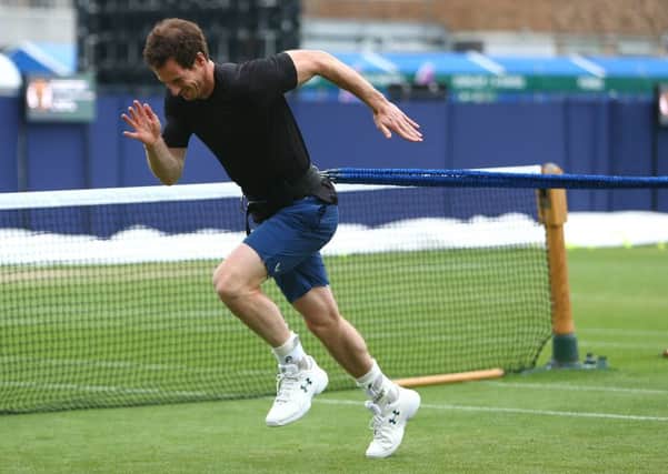 Andy Murray at full stretch during training ahead of his doubles match at Eastbourne. Picture: Getty (for LTA).