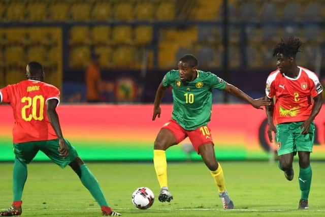 Hearts midfielder Arnaud Djoum in action for Cameroon against Guinea-Bissau. Picture: AFP/Getty Images