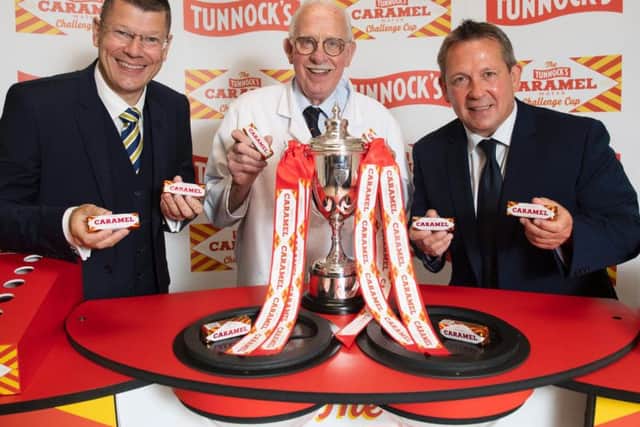 SPFL chief executive Neil Doncaster, Sir Boyd Tunnock, owner of Thomas Tunnock Limited, and former Scotland player Billy Dodds.
