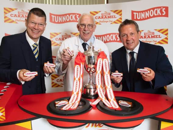 SPFL chief executive Neil Doncaster, Sir Boyd Tunnock, owner of Thomas Tunnock Limited, and former Scotland player Billy Dodds.