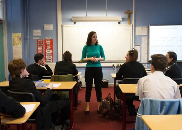 Could you stand in front of a classroom of teenagers, teach them valuable lessons while maintaining strict but friendly discipline? (Picture: John Devlin)