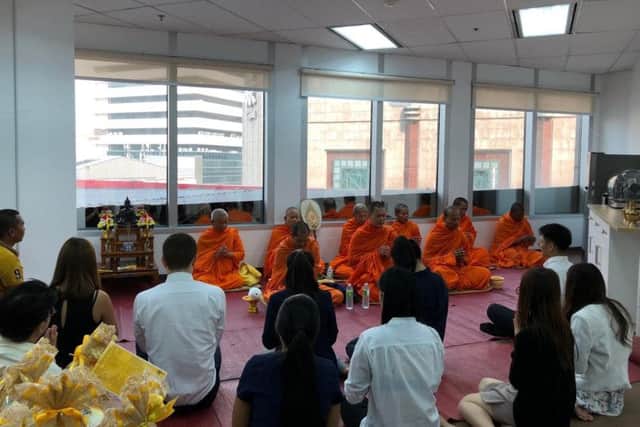 The Bangkok branch of Cathcart Associates receives a traditional Thai blessing, said to bring good luck and prosperity. Picture: Contributed