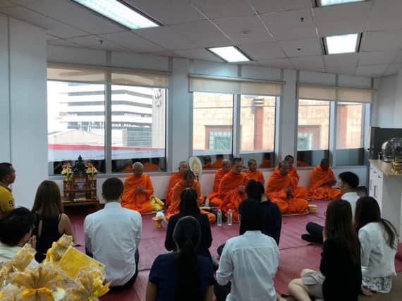 The Bangkok branch of Cathcart Associates receives a traditional Thai blessing, said to bring good luck and prosperity. Picture: Contributed