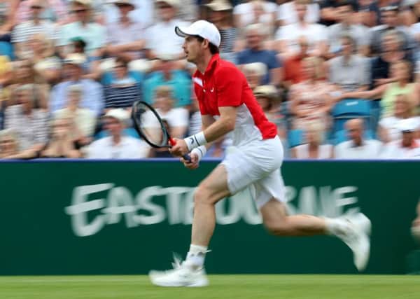Andy Murray sprints to chase down a ball at Eastbourne. Picture: Bradley Collyer/PA Wire