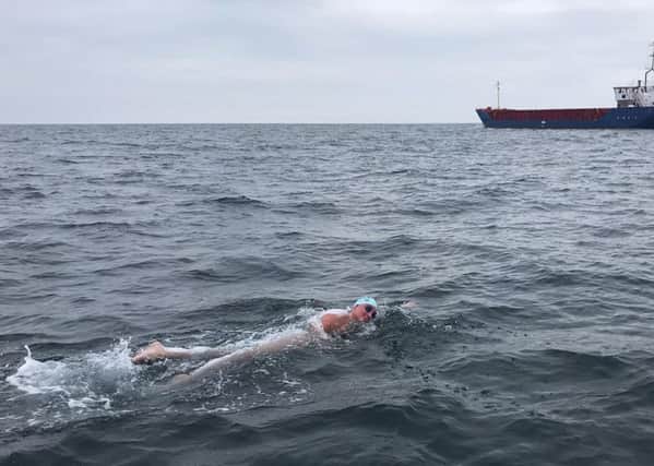 Catherine Breed, 26, from California during her successfull swim of the North Channel from Northern Ireland to Scotland. Picture: Infinity Channel Swimming/PA Wire