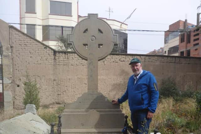 Dr Stewart Redwood, a geologist originally from Glasgow, at the grave of Andrew Penny Jnr. PIC: Contributed.