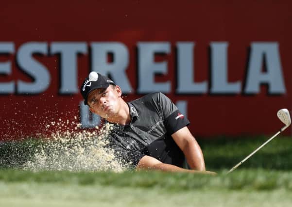 Christiaan Bezuidenhout plays out of a bunker at Valderrama. Picture: Luke Walker/Getty